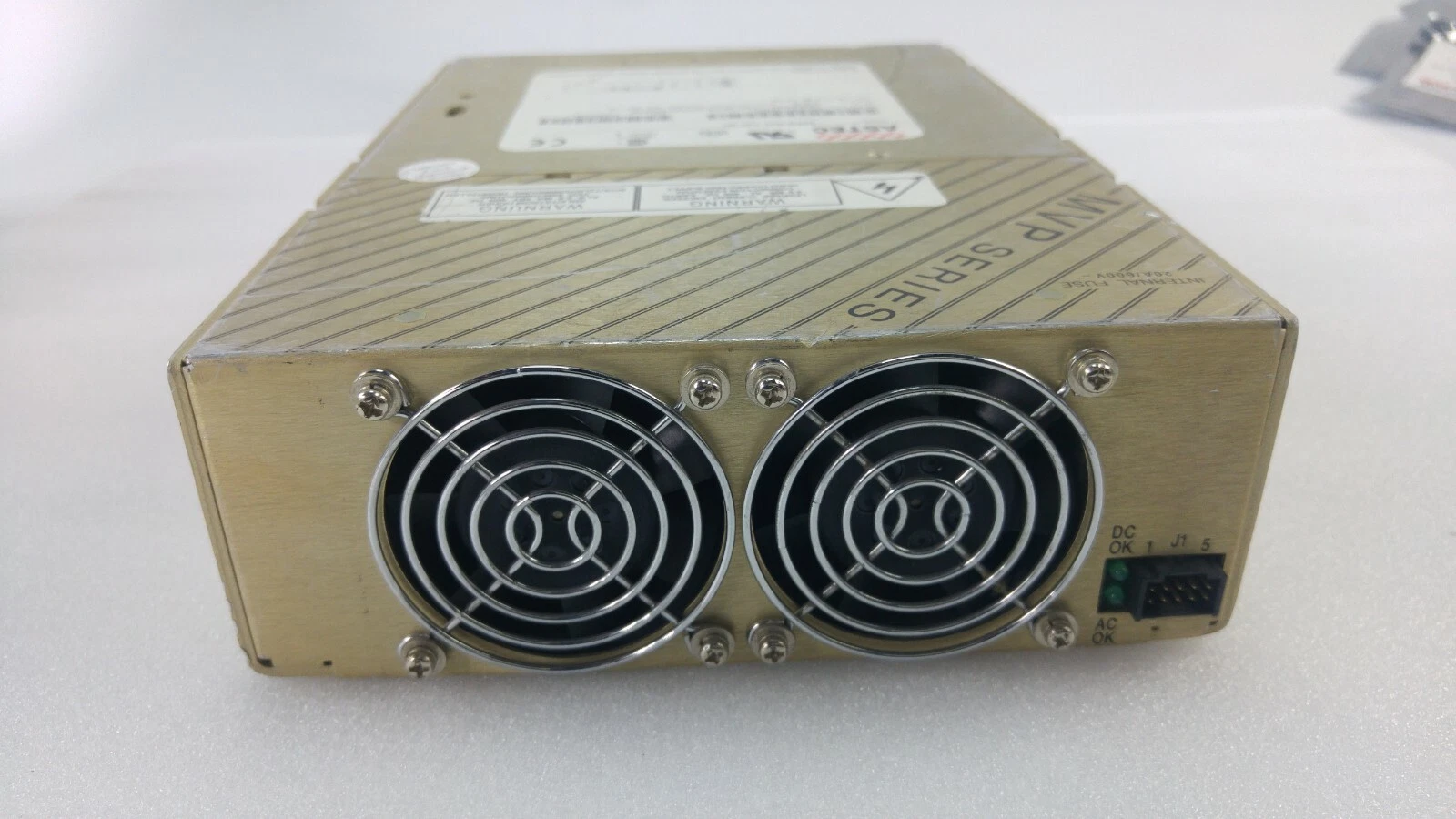 Fan end of the Astec MP8 with two fans, DC OK and AC OK LEDs and J1 connector