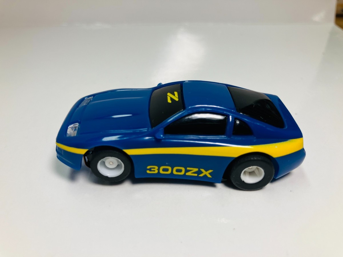 TYCO ~ NISSAN 300ZX ~ BLUE / YELLOW slot car ~ BRAND NEW