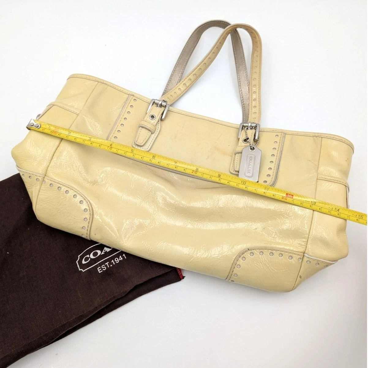 Borsa a mano Coach vintage in pelle verniciata lucida beige argento taglia unica