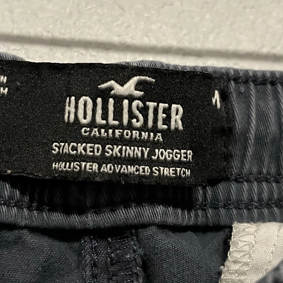 Pantalones de chándal chinos ajustados elásticos avanzados Hollister para hombre talla M gris y cordón Foto 3 de 4