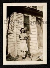 WW2 ERA SOLDIER HOME HUGGING WOMAN/WIFE OLD/VINTAGE PHOTO- A83