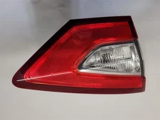 Used Left Tail Light Assembly fits: 2015 Ford Fusion lid mounted Hybrid SE L. Le
