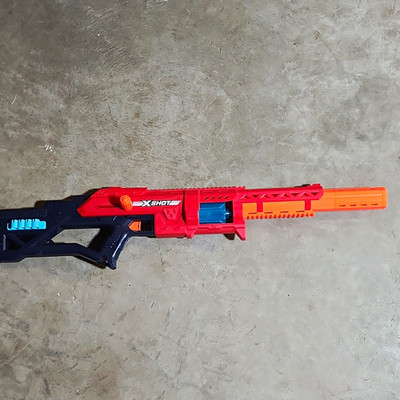 X-Shot Foam Dart Blaster  Red/Black/Orange/Blue