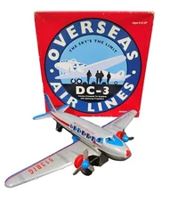 Schylling OVERSEAS AIR LINES DC-3 Friction Powered Tin Airplane, Propellers Spin