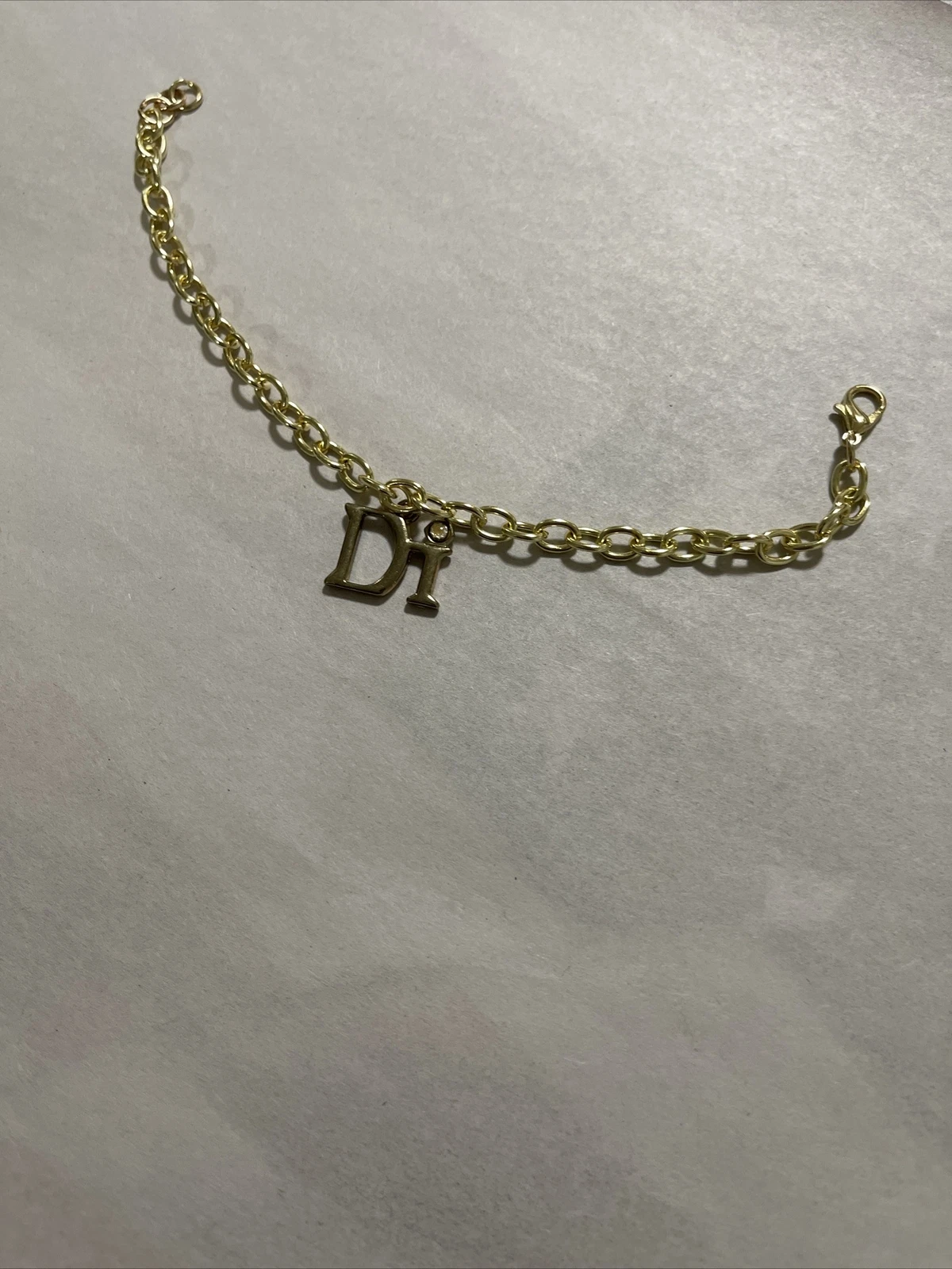 Bracelet Chaîne Diamonds International Goldtone avec Charme DI 7 3/4