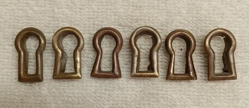 LOT OF SIX ANTIQUE FLUSH MOUNT OR INSERT BRASS ESCUTCHEON KEYHOLE COVERS