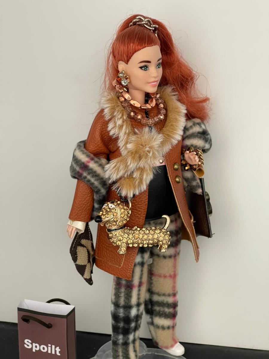 Barbie doll with handmade designed luxury fashion clothes with dog