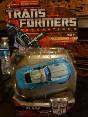 2010 TRANSFORMERS GENERATIONS BLURR Autobot Deluxe Class CHUG MOC NEW misb