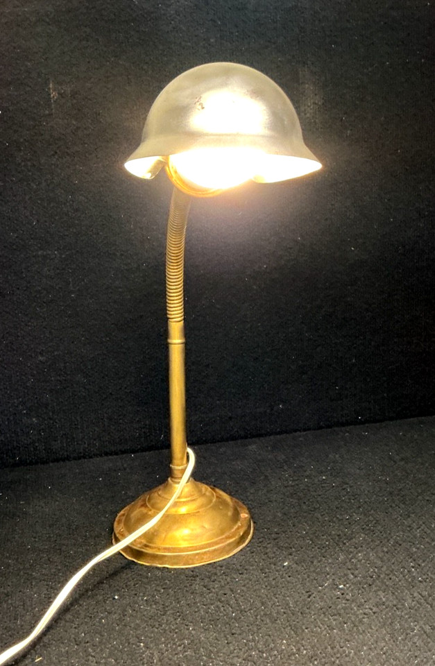 A classic vintage brass gooseneck desk lamp — infinitely poseable, instantly characterful, and genuinely aged rather than fake-vintage.