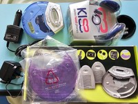 Portable CD player, DC car kit, AC, AA battery, 2x interchangeable coloured lid