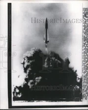 1957 Press Photo Raytheon Manufacturing Co rocket at launch tests