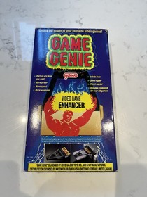 Nintendo&rsquo;s NES Codemasters Game Genie - 1990 - Original Box & Manual