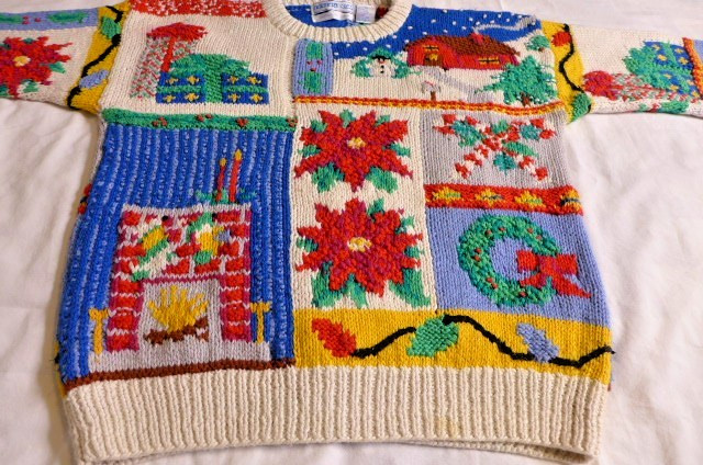 A genuinely vibrant, hand-knit Christmas novelty sweater — the kind of loud, lovingly crafted vintage piece that modern fast fashion can't replicate.
