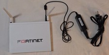 Fortinet FWF-60E security appliance, adapter,  antennas. Preowned. Excellent.