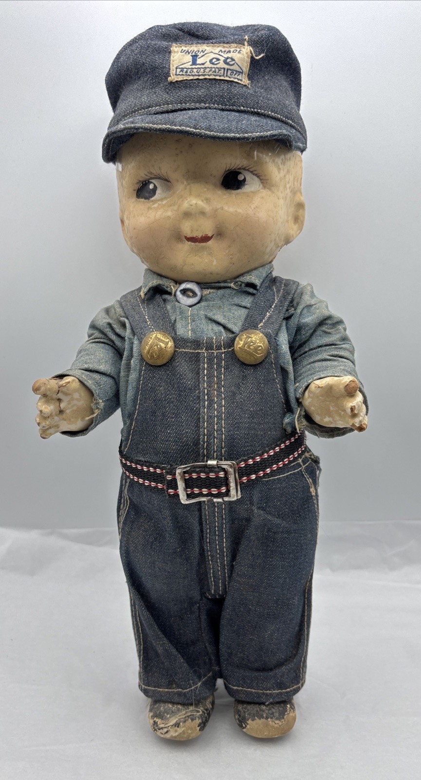 Buddy Lee Antique Composition Doll In Jeans 1930S Or 40S Shows some damage.
