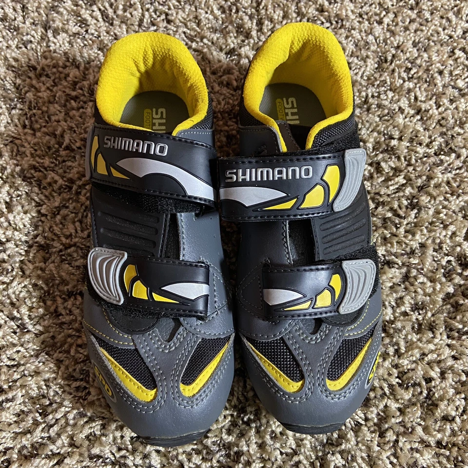 Zapatillas de ciclismo Shimano SPD para mujer 6 (39) grises con adornos amarillos SH-M082W Foto 2 de 4