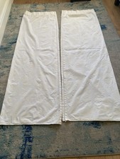 A Pair Of Ivory Embossed Curtains. Length 177cm (70”) X 102cm (40”)