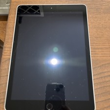 iPad 5th Generation A1822 non working just the tablet with no power cord