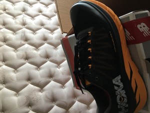 hoka one one challenger atr 4 black kumquat