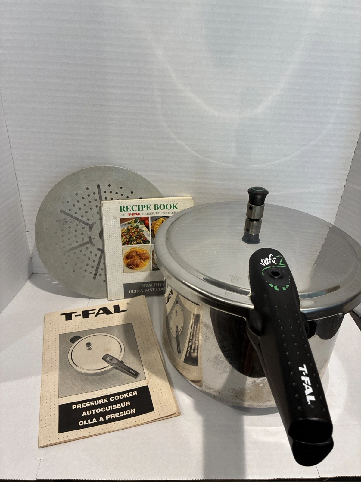 T-FAL Pressure Cooker, All Aluminum Cookware, Dishwasher Safe, 12 PSI/manual