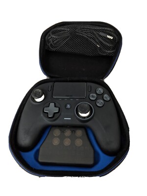 PS4Elite gaming controller with the weights, charger , and the controller itself