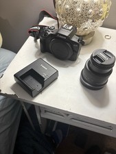 Canon EOS R100 Mirrorless With Lens 18-44mm Includes Charger And Battery