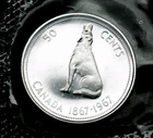 1967 50¢ silver in original mint cellophane UNC and MS and flawless