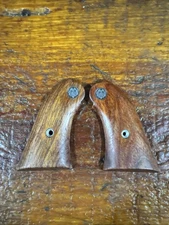 Factory Ruger Bearcat Smooth Wood Grips With Silver Medallions.