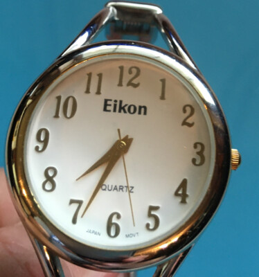 *PRE-OWNED* EIKON-SILVER CLAMP BAND LADIES WATCH(needs battery)-FREE SHIPPING*