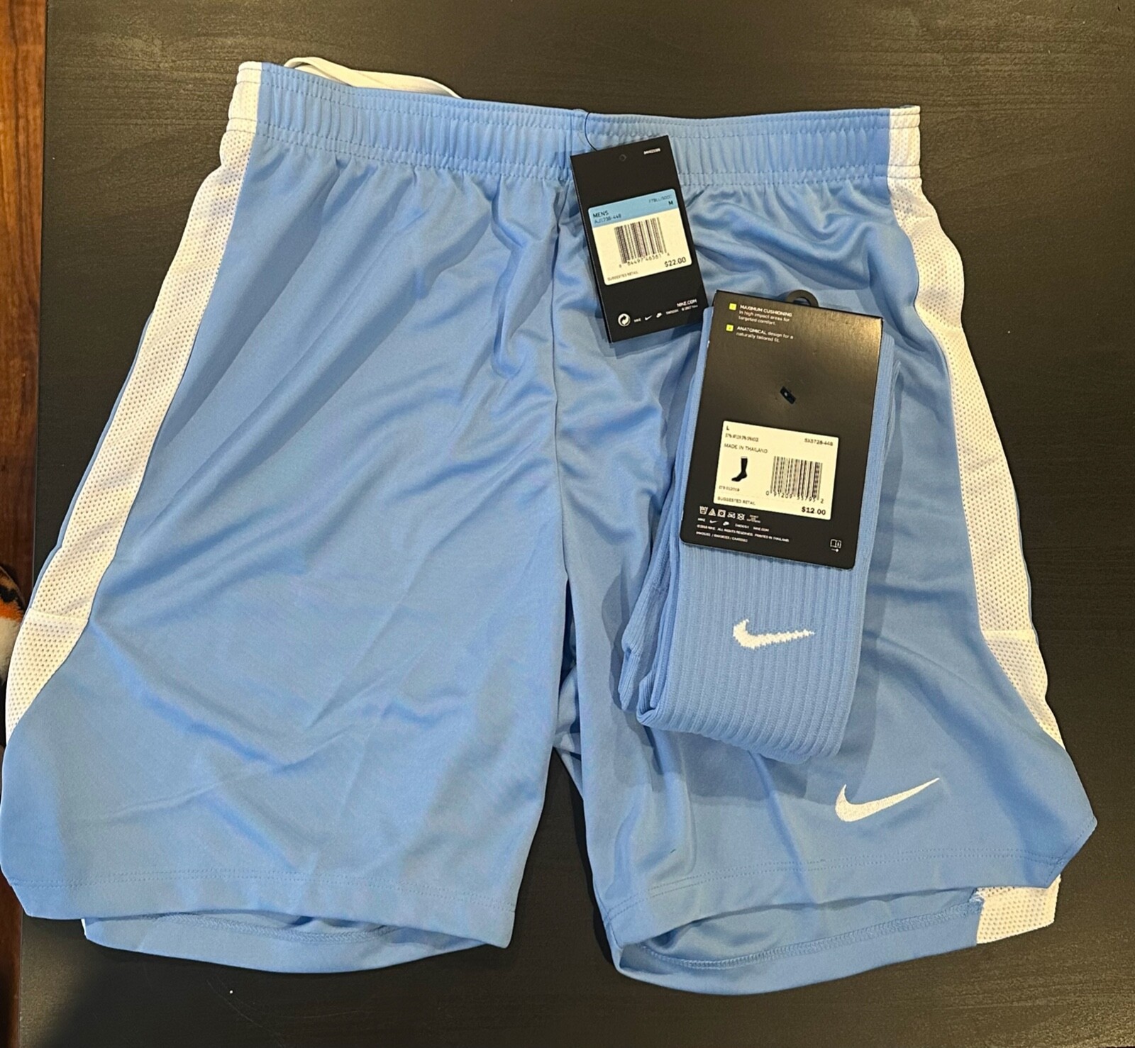 Nike soccer shorts and socks (Brand New w/ tags) Medium shorts / Socks