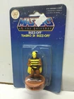 Mattel Masters of Universe He-Man Stamper STAMP Serie 1 BUZZ-OFF 2.5" MOC, 1985