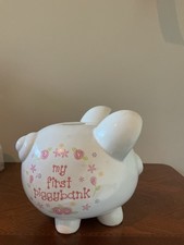 ceramic piggy bank is the Baby Essentials "My First Piggy Bank".