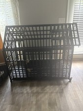 Heavy duty dog crate for large/medium Dogs. Black Metal cage with spire roof.