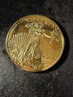 🔥.999 Fine Silver coin Lady Liberty One half Pound.999 Fine Gold on outside