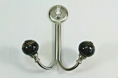 Two Wall Mount Ball Hooks.