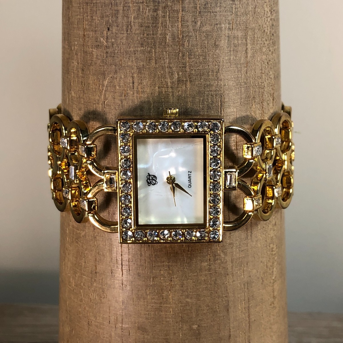 Elizabeth Taylor Women Mother of Pearl Pave Bezel Gold Dial 