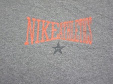 Vintage Nike Athletics 1990's Men’s T Shirt Size (XL) Star Logo USA Made Faded
