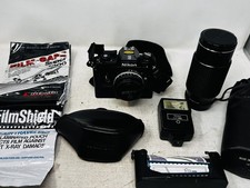 Nikon EM 35mm SLR Film Camera w/ Prime 50mm  Tokina 70-210mm Zoom Lens