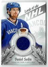 2013-14 CROWN ROYALE LORDS OF THE NHL MATERIALS DANIEL SEDIN JERSEY 1 COLOR