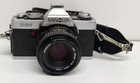 New ListingMinolta Xg-1 35mm Slr Film Camera - Md 50mm 1:2 Mickey Bobby Lee Strap Read