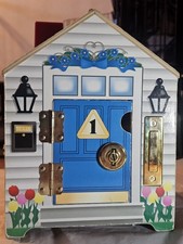 Melissa  Doug Wooden Doorbell House with 4 Doors Keys  Working Doorbells