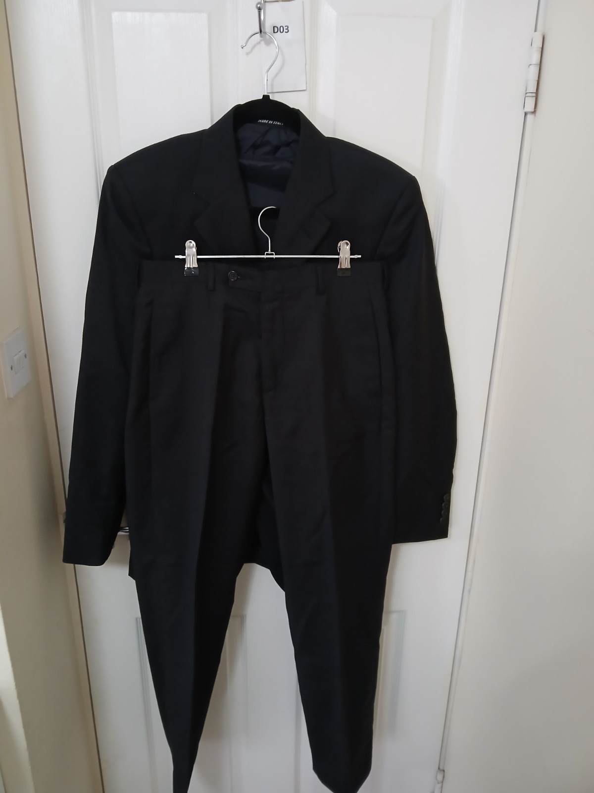 SAINT LAURENT Tuta Ysl pura lana nuova nera