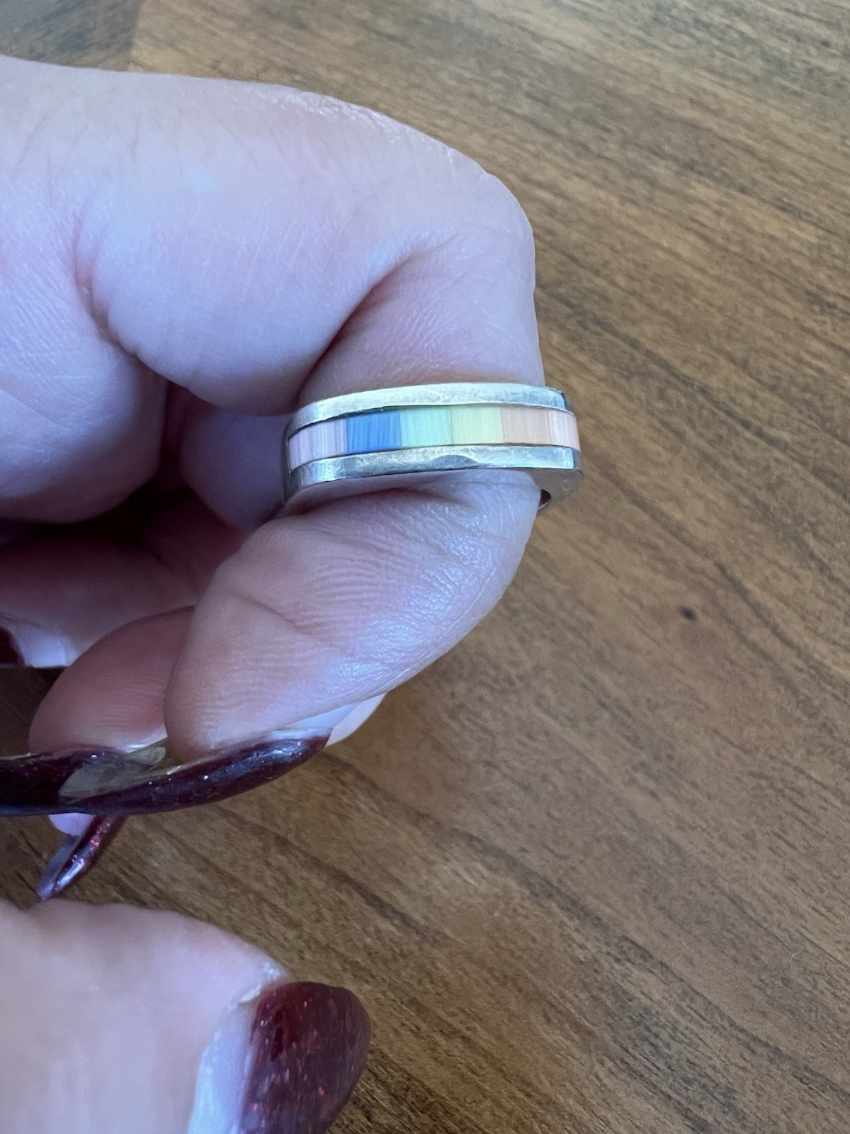 Beautiful sterling silver ring with a rainbow inlay band