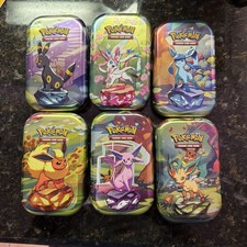 Prismatic Evolutions Tins Empty Filled With Holos And  Rev holos