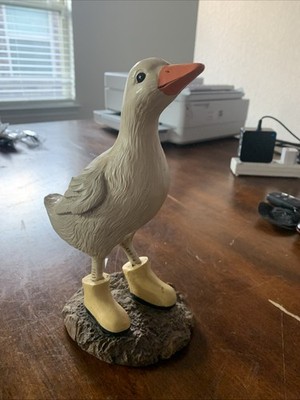 Almost 8 Inches In Height Ivory Ceramic Duck In Yellow Boots On A Rock