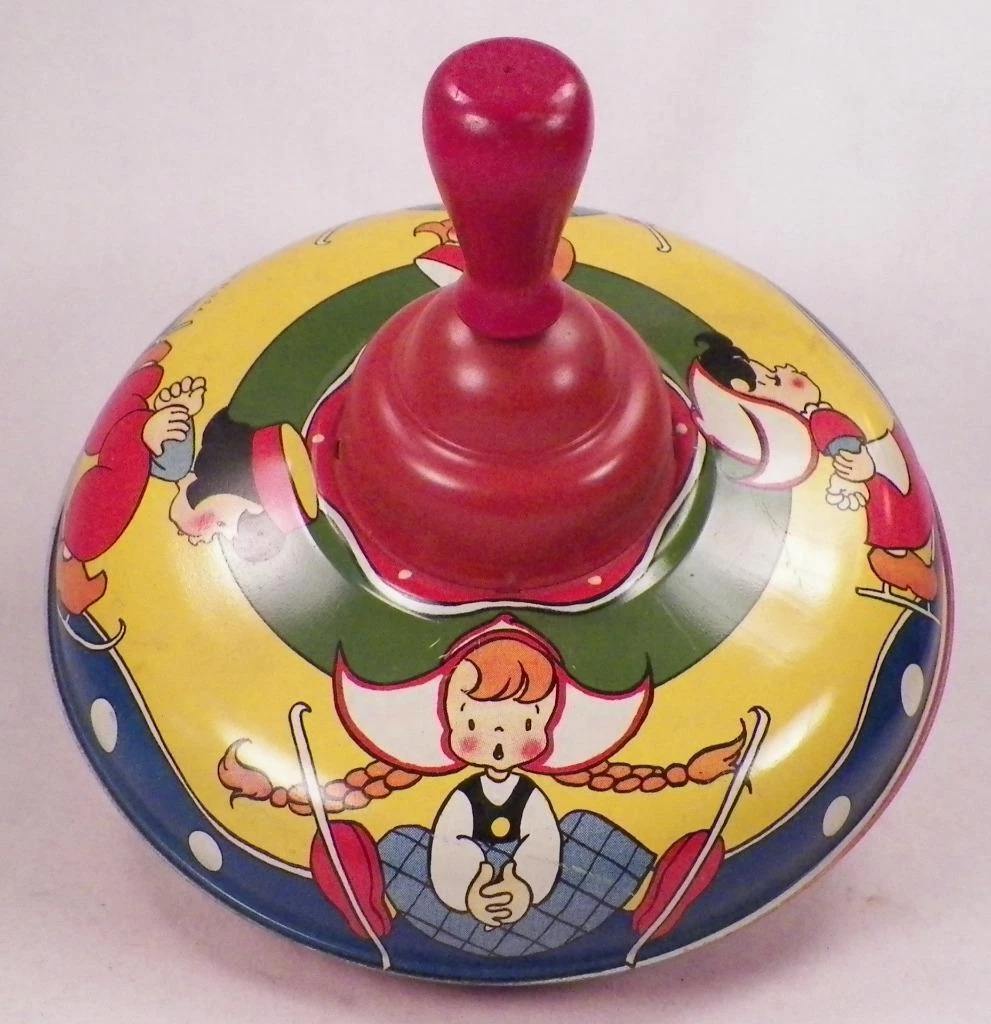 Tin spinning best sale top toy