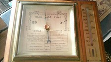 vintage barometer and thermometer in lovely wooden mount
