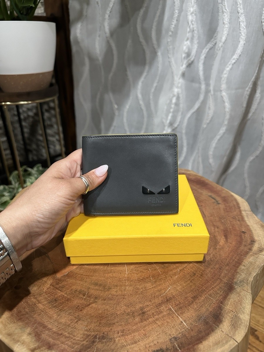 FENDI レザーケース 黒 目デザイン Fendi Monster Eyes Bifold Wallet Black Leather Yellow Interior