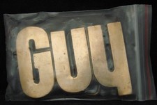 SA10136  NOS  VINTAGE 1970s/80s CUT-OUT NAME  GUY  SOLID BRASS BUCKLE