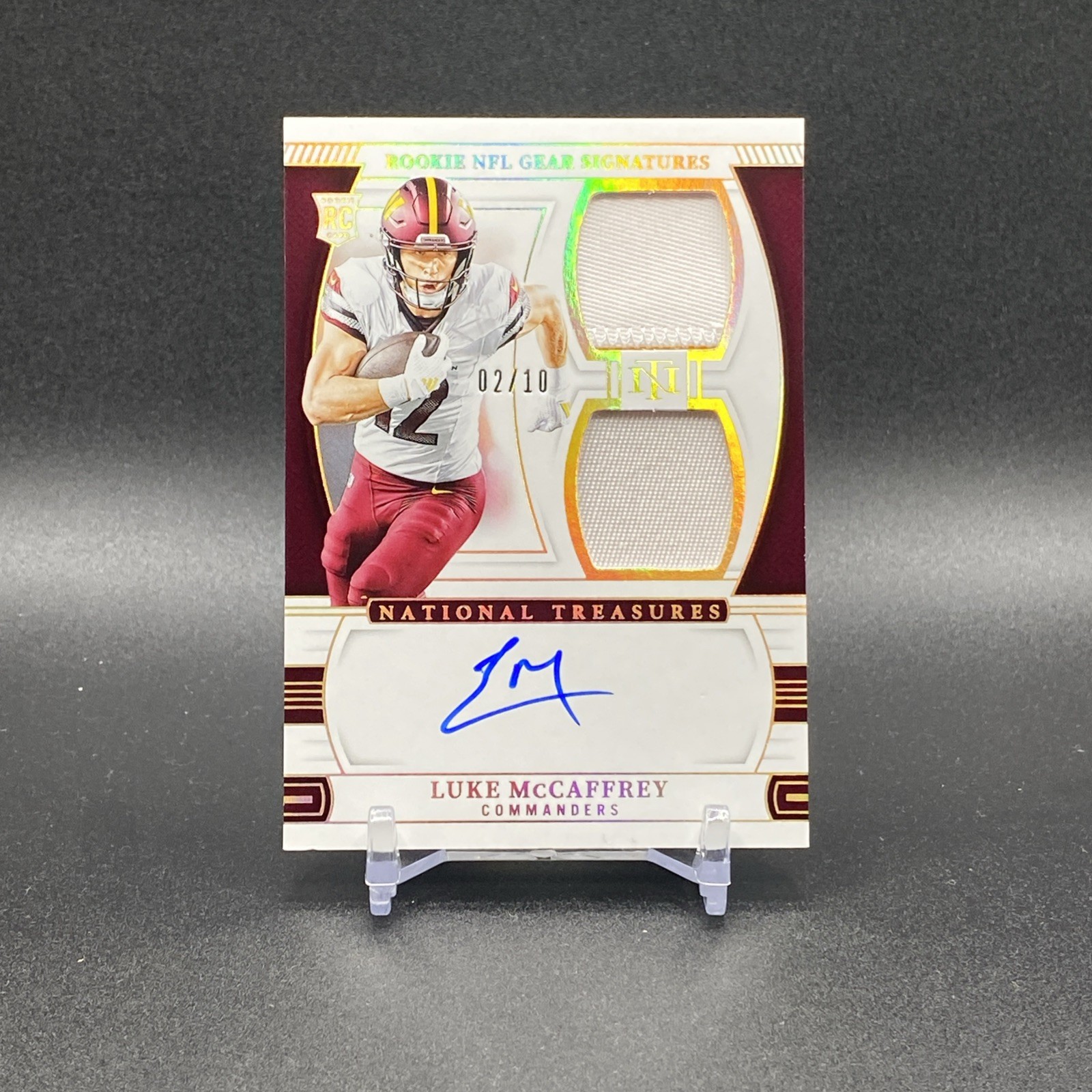 Luke McCaffrey Panini National Treasures Rookie NFL Gear Signature Combos #LMY Base